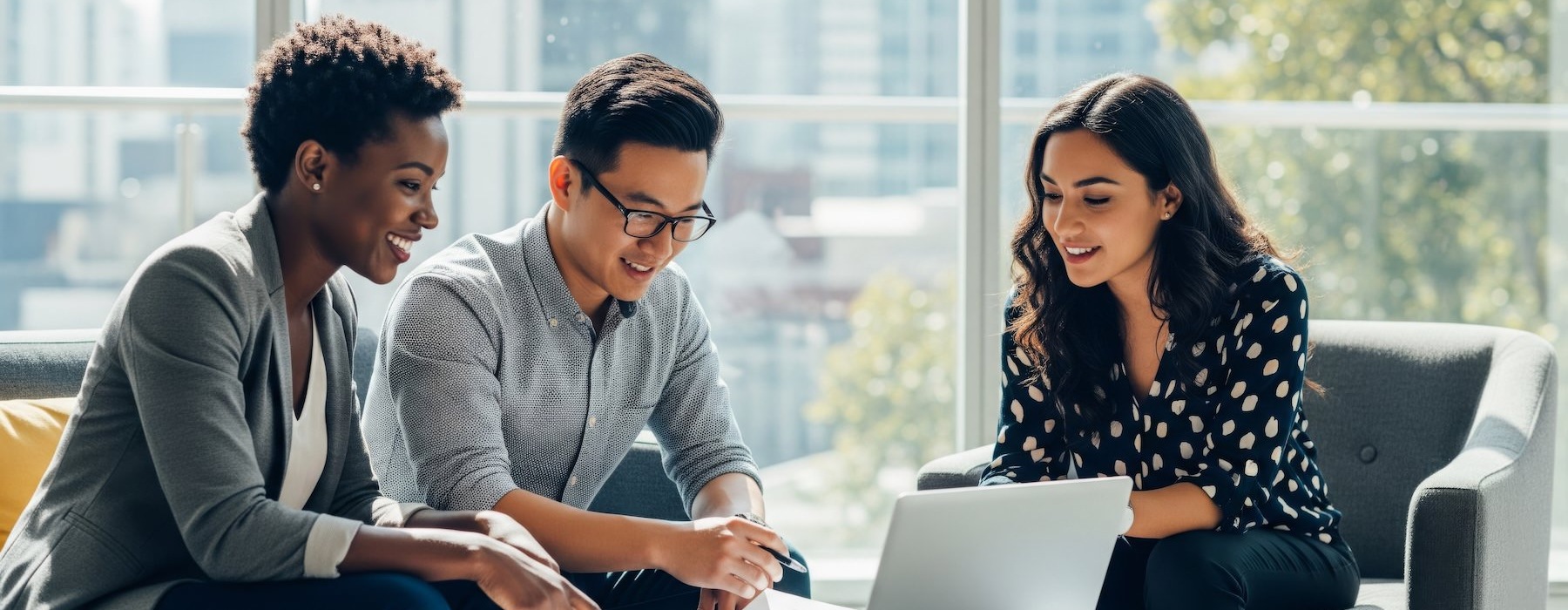 coworkers looking at a computer