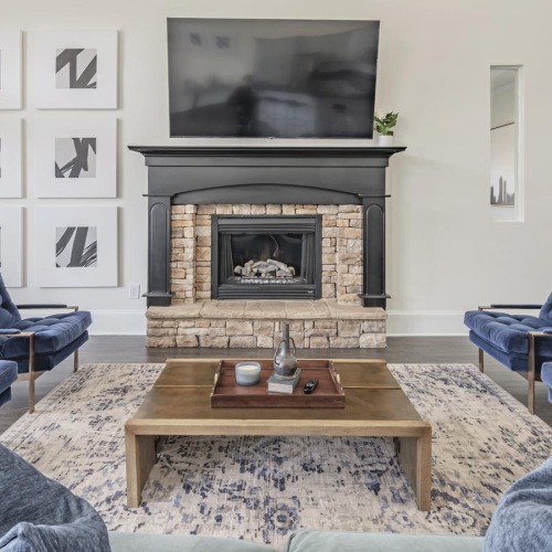 a living room with a fireplace